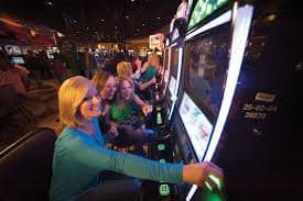 Close-up of a mobile screen showing winph ph game lobby categories including slots and live tables